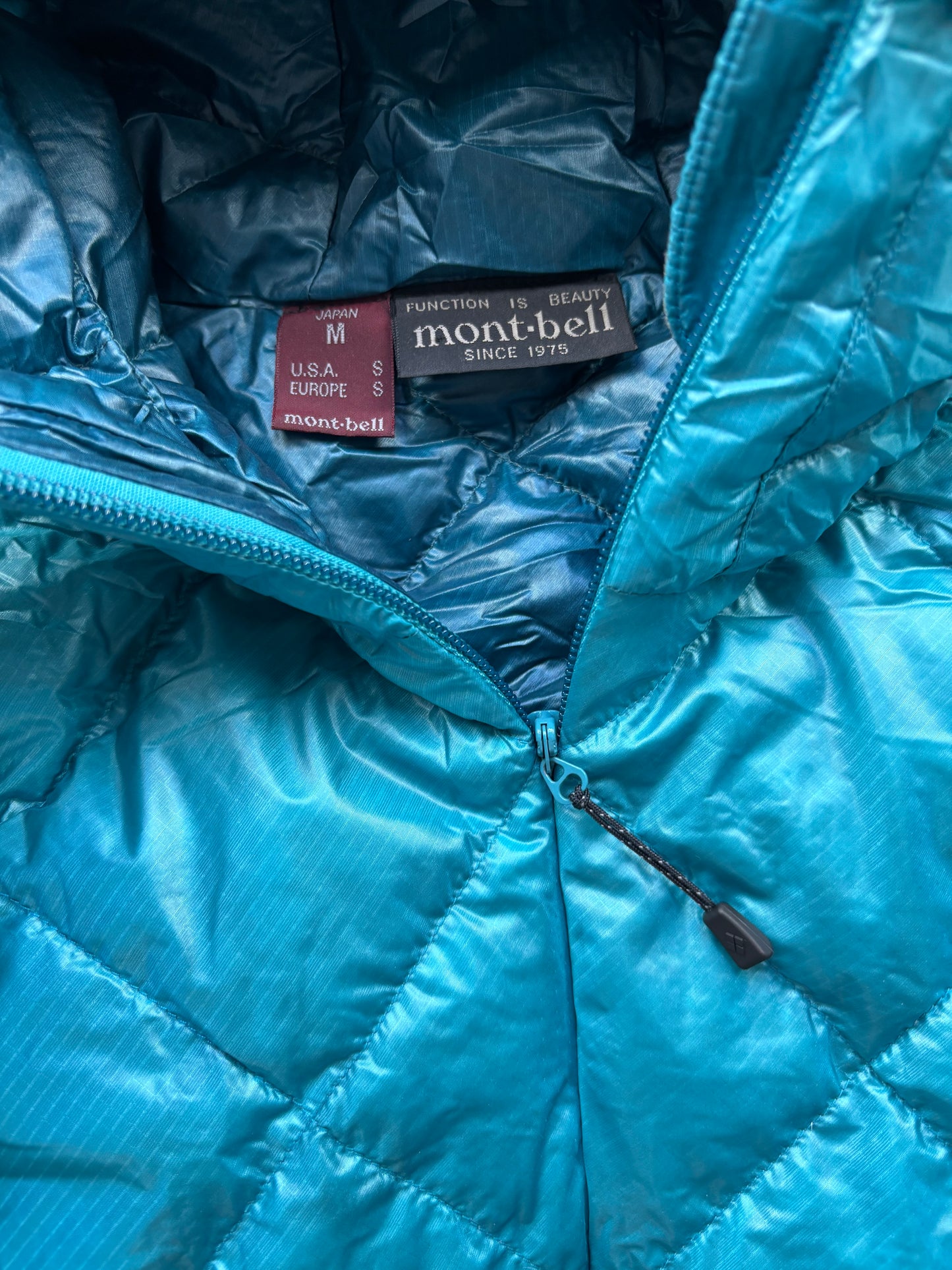 MONTBELL LIGHT BLUE PUFFER JACKET (S)