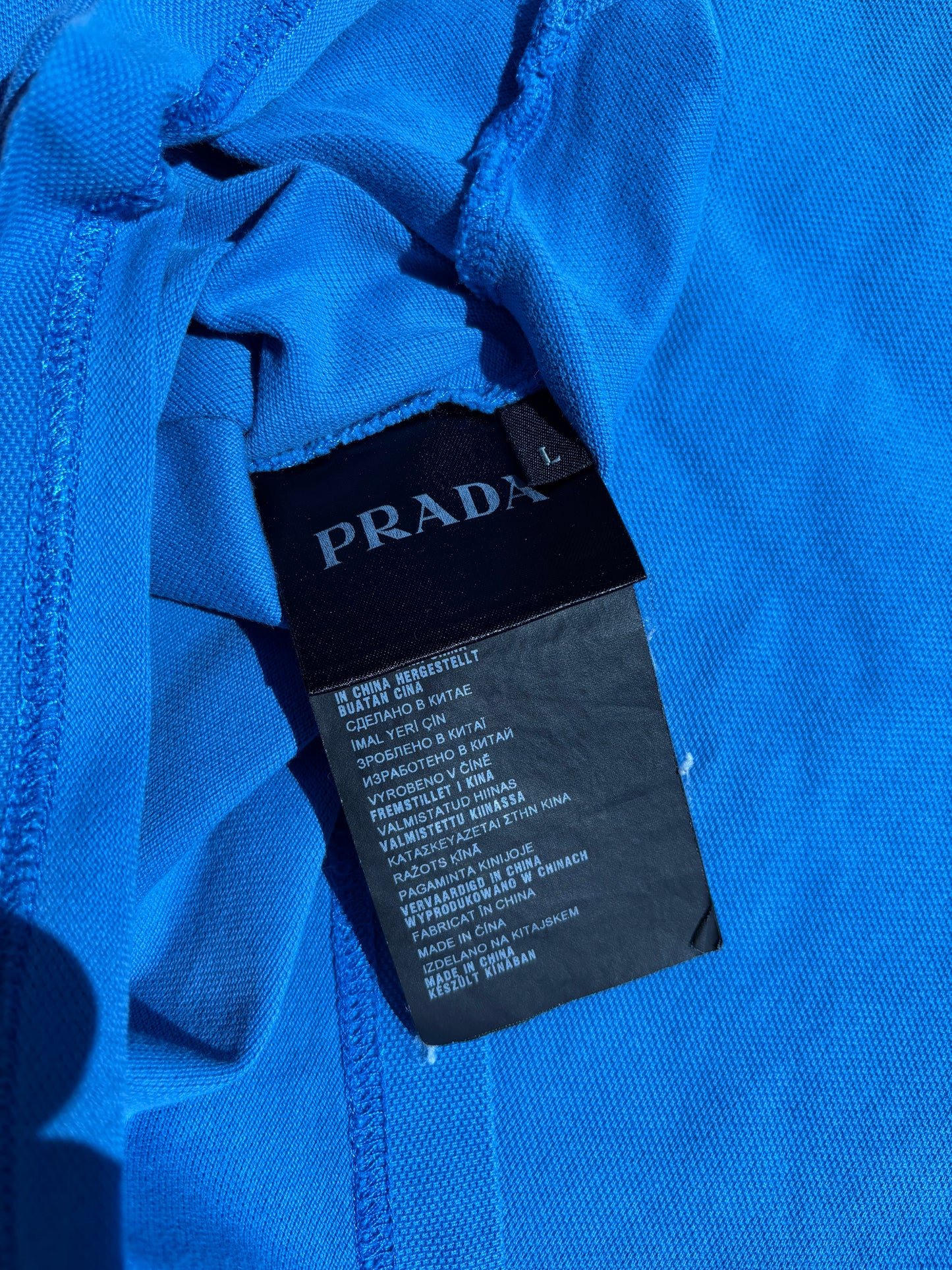 PRADA LINEA ROSSA POLO SHIRT (L)